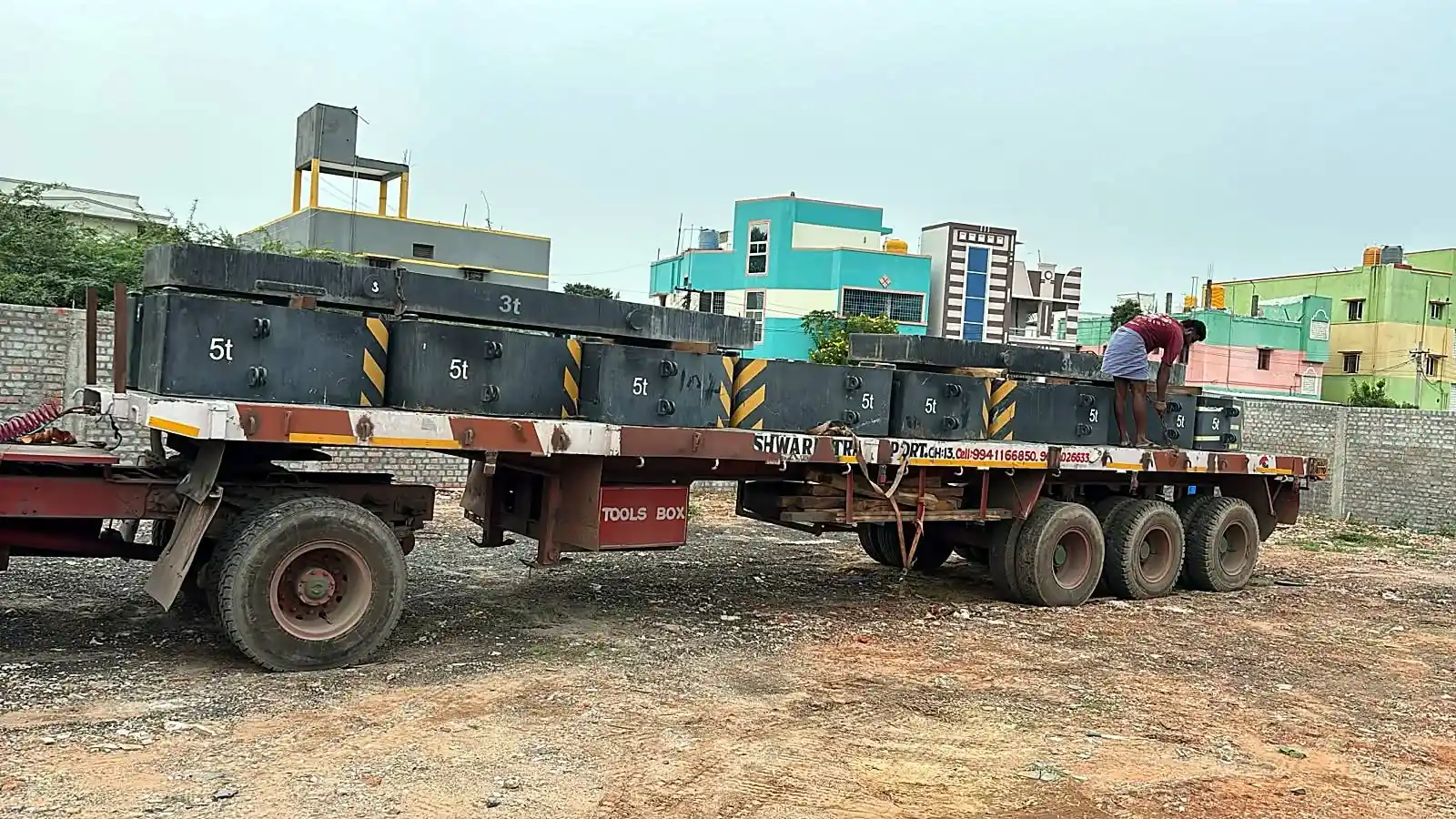 Part Load transport from Chennai: Heavy steel blocks on a flatbed trailer